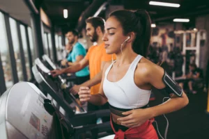 4 Ways To Make Your Treadmill Runs Less Miserable, According to a Run Coach
